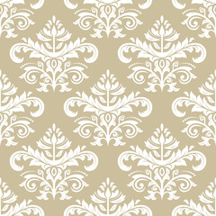 Classic seamless pattern. Damask ornament. Classic vintage background. Golden and white ornament for fabric, wallpapers and packaging