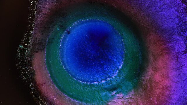 Inks splash macro. Liquid abstract background. The Universe Cosmos Eye of God Nebula