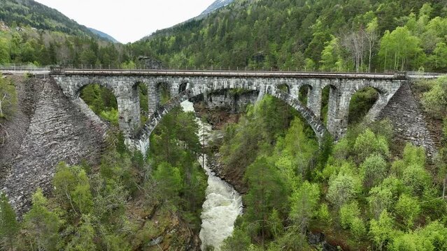 Kylling bridge in Rauma passing above gorge with river Verma - Closeup detailed aerial view