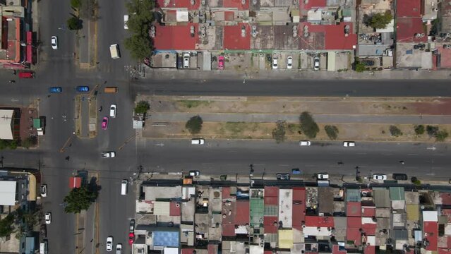 Aerial overhead view ecatepec neighborhood roads with cars and homes. Residential area. Mexico city north suburbs. Ecatepec de Morelos. Latin america and lifestyle concept