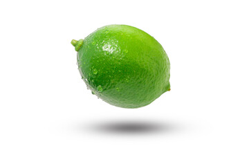 Flying green lime has water drop isolated on white background.  clipping path.