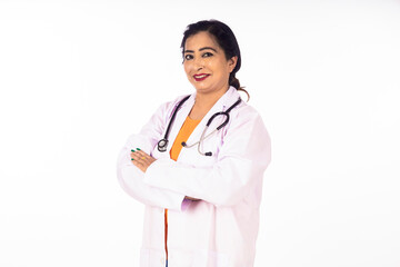 Fototapeta premium Medical concept, Indian doctor in uniform standing on white background.