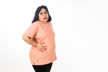 indian senior woman feeling pain in stomach
