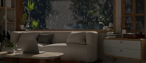A cozy contemporary living room on a rainy day, a comfortable couch against the window