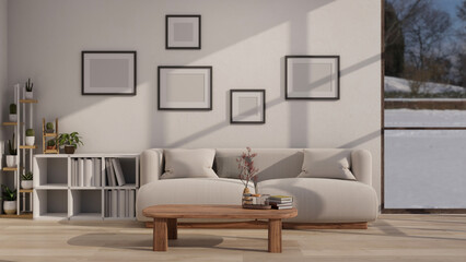 Obraz premium A comfortable and modern living room with a comfy couch against the wall, a coffee table