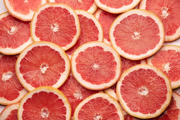 top down background view made of Fresh Sliced organic grapefruit close-up