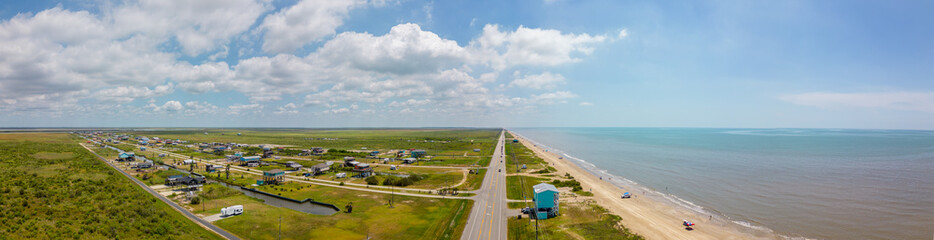 Aerial panorama coastal homes at Port Bolivar Beach Texas