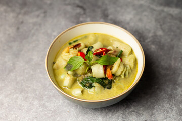 Green Curry Sea Food served in dish isolated isolated on background top view of bangladesh food