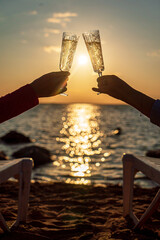 women drinking champagne on the beach © Maksim Shebeko