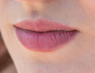 Fototapeta premium Lips on the girl's face. Macro