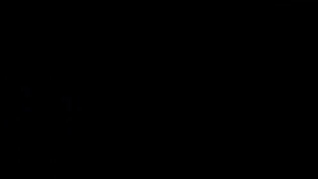 a small child turns the light on and off by pressing the switch on the wall. child playing with the lights off in the apartment