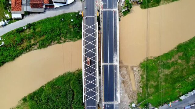 Wonokerto Bridge, Demak Regency, Central Java, Indonesia, which facilitates the transportation of goods and services for the north coast region