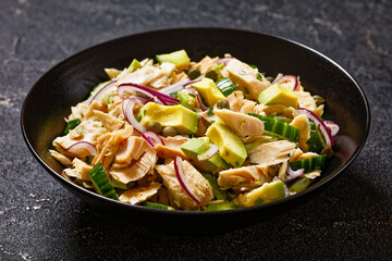 tuna salad with avocado, onion, cucumber, capers