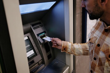 Unidentified Man at ATM for Cash Withdrawal