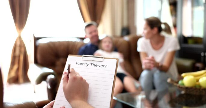 Mother child father on family therapy communicate with psychotherapist. Helping family therapist
