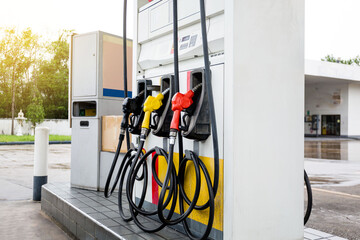 Gasoline station prepare for traveller fill to tank  near  shop and sun light.
