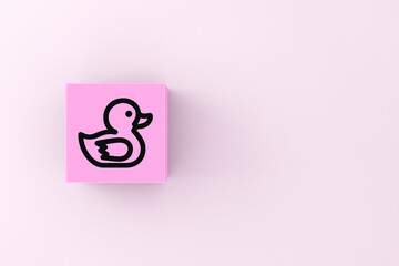 Duck icon on a pink cube block on pink background.