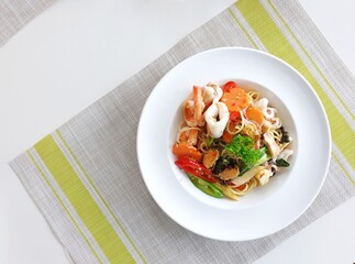 Spicy seafood spaghetti at local restaurant in Thailand, Asia.