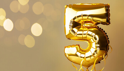 Banner with number 5 golden balloons with copy space. Five years anniversary celebration concept on...