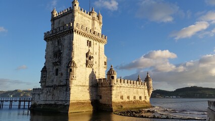  a tall tower with a clock on the top of it