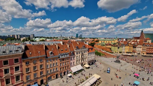 Warsaw, Poland  August 2, 2023: time lapse. old city, square and Royal Castle in Warsaw from the top of the tower. Poland