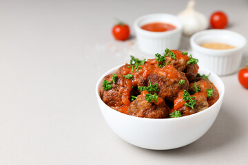 Tasty meat food and homemade food concept - meatballs