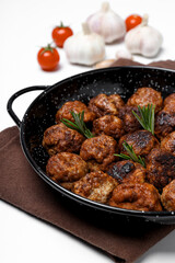 Tasty meat food and homemade food concept - meatballs