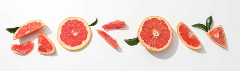 Naklejka na ściany i meble Juicy summer fruit - grapefruit, concept of fresh food