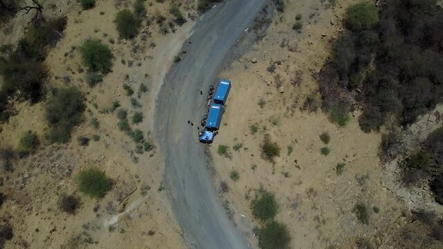 Aerial view of a truck overturned on a mountain roadOmo ValleyKonso Ethiopia