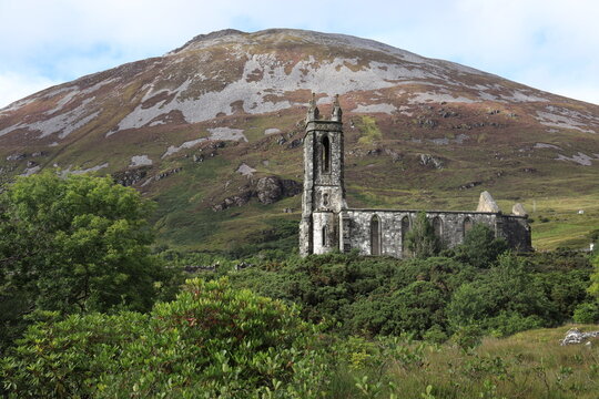 The Old Church, Dunlewey, an abandoned Church of Ireland church against a backdrop of Errigal Mountain in rural County Donegal, Ireland