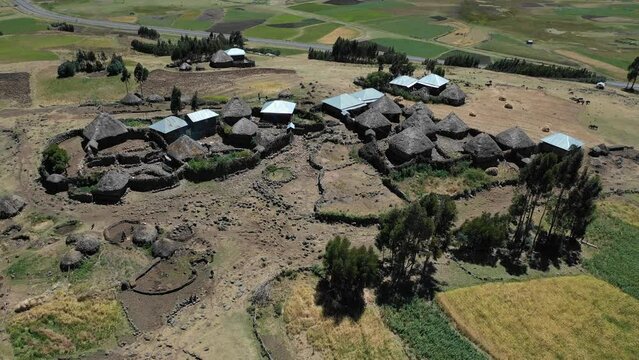 Aerial view of a Village with tukuls in the highlands AmharaWeldiya Ethiopia