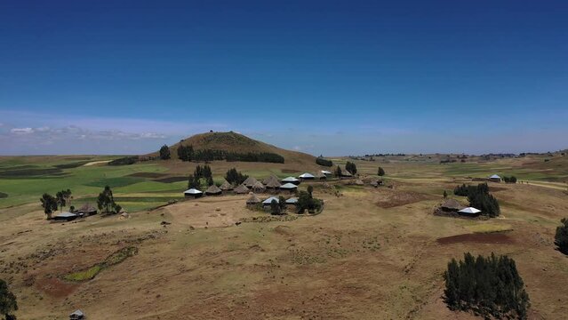 Aerial view of a Village with tukuls in the highlands AmharaWeldiya Ethiopia