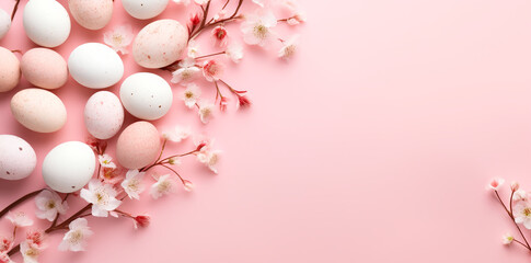 Easter arrangement of eggs and flowers in light pink colors