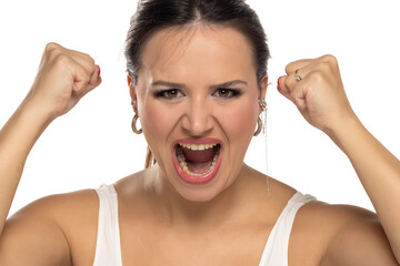 Nervous woman screams yell shout on a white background