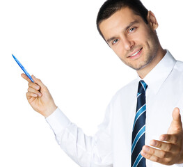 Happy smiling young business man showing blank area for sign or copyspace, isolated over white...