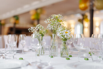 Beautiful flower decoration on a table at a wedding reception