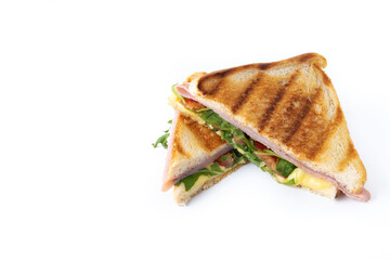 Panini sandwich with ham, cheese, tomato and arugula isolated on white background. Copy space