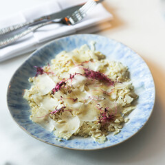 Healthy cauliflower carpaccio with cheese