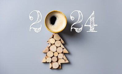 Happy new year 2024 background new year holidays card with coffee cup and eco friendly christmas tree. Sustainable, zero waste concept. New Year 2024 resolutions, goals, copy space