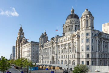 Fototapeta na wymiar Liverpool, united kingdom May, 16, 2023 Pier Head and The Three Graces, consist of the Royal Liver Building, The Cunard Building and the Port of Liverpool Building