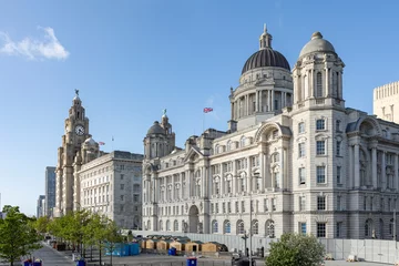 Fototapeten  Liverpool, united kingdom May, 16, 2023 Pier Head and The Three Graces, consist of the Royal Liver Building, The Cunard Building and the Port of Liverpool Building © © Raymond Orton