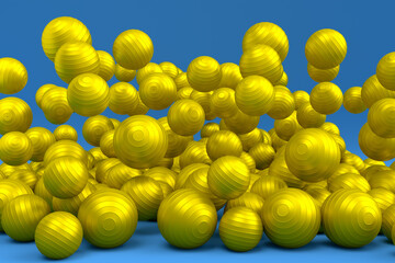 Many of flying yellow fitness ball or fitball falling on blue background