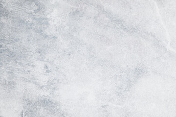 Texture of gray concrete background. Light wallpaper with rough cement texture. Decorative nature wall concept, surface mockup. Abstract grunge backdrop for art design. Top view, close up, copy space