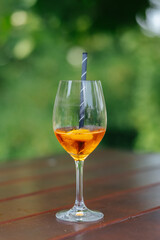 Alcoholic drink in a glass at a wedding reception close-up