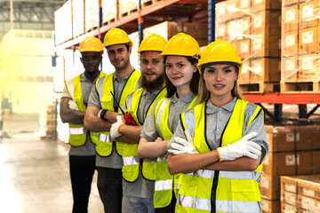 Photogroup of diversity warehouse workers standing armcrossed in distribution warehouse