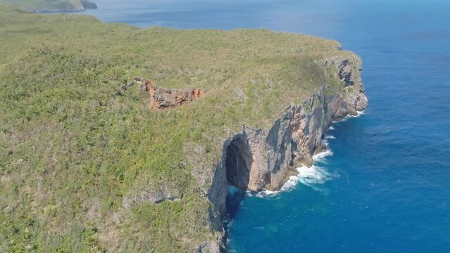 Cabo Cabron three doors location In Samana, Dominican Republic. Aerial drone backward view