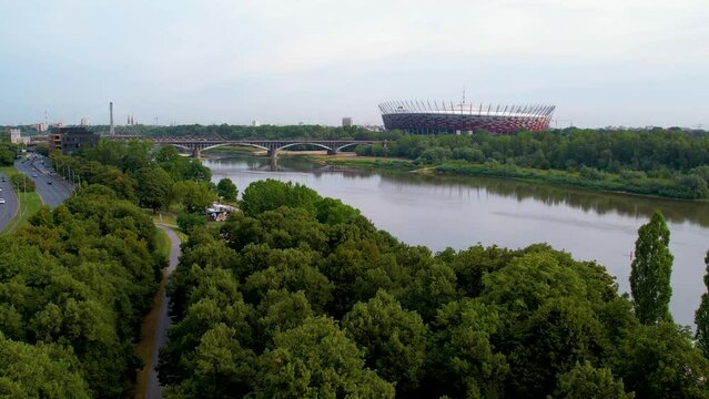 Aerial View of Poniatowski Bridge Over Vistula River and PGE Narodowy National Stadium in Praga district of Warsaw On Summer Day 