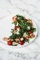 Healthy arugula salad with shrimps