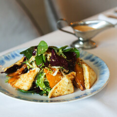 Spinach salad with roasted pumpkin and cheese