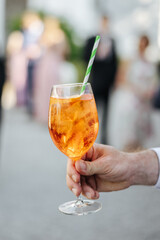 Alcoholic drink in a glass at a wedding reception close-up